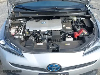 2021 Toyota Prius L Eco with VIN JTDKAMFU7M3143961, listed as a IAAI auction lot 41486032 with 58,979 mi miles. Bid and sale history available at carsss.com. Image 10.