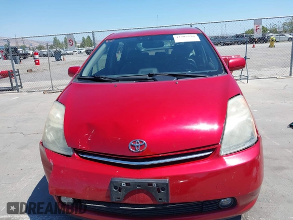 2007 Toyota Prius z VIN JTDKB20U373288946, wystawiony jako IAAI lot #42385536 z przebiegiem 133 336 mil mil oraz . Historia ofert i sprzedaży dostępna na DreamBid. Obrazek 12.