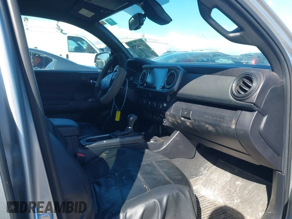 2022 Toyota Tacoma SR5 with VIN 3TMDZ5BN6NM122590, listed as a IAAI auction lot 41714578 with 56,472 mi miles and . Bid and sale history available at DreamBid. Image 5.