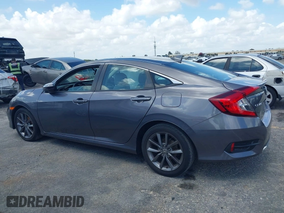 2021 Honda Civic Sedan EX with VIN 19XFC1F34ME001481, listed as a IAAI auction lot 41943440 with 35,851 mi miles. Bid and sale history available at carsss.com. Image 14.