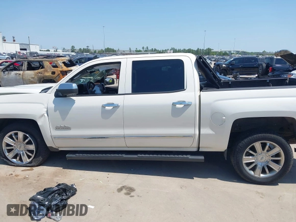 2014 Chevrolet Silverado 1500 High Country with VIN 3GCUKTEC4EG409072, listed as a IAAI auction lot 41986843 with 124,058 mi miles. Bid and sale history available at carsss.com. Image 15.