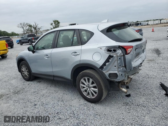 2016 Mazda CX-5 Sport with VIN JM3KE4BY1G0799275, listed as a Copart auction lot 51202355 with 98,409 mi miles and Non Repairable. Bid and sale history available at carsss.com. Image 2.