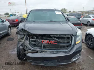 2015 GMC Yukon XL SLT with VIN 1GKS1HKC8FR219289, listed as a IAAI auction lot 40772496 with 163,477 mi miles. Bid and sale history available at carsss.com. Image 12.