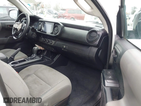 2021 Toyota Tacoma SR with VIN 3TYAX5GNXMT032184, listed as a IAAI auction lot 42204429 with 60,295 mi miles and . Bid and sale history available at DreamBid. Image 5.