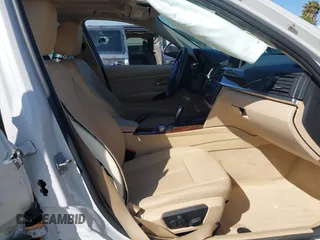 2014 BMW 3 Series 320i with VIN WBA3B1G50ENN90657, listed as a IAAI auction lot 42304612 with 129,377 mi miles and . Bid and sale history available at DreamBid. Image 5.