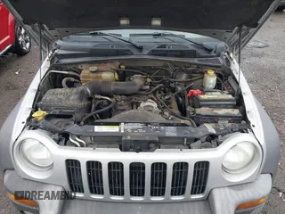 2004 Jeep Liberty Sport with VIN 1J4GL48K74W318861, listed as a IAAI auction lot 41706222 with 211,089 mi miles. Bid and sale history available at carsss.com. Image 10.