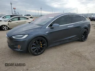 2016 Tesla Model X 70D z VIN 5YJXCAE29GF006512, wystawiony jako Copart lot #57517885 z przebiegiem Nie podano mil oraz Szkoda całkowita • Salvage title. Historia ofert i sprzedaży dostępna na DreamBid. Obrazek 1.