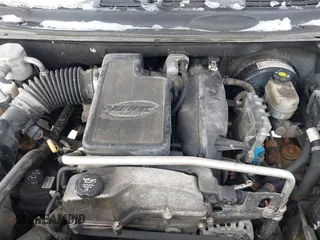 2007 GMC Envoy SLE with VIN 1GKDT13S072246688, listed as a IAAI auction lot 41258265 with 218,001 mi miles. Bid and sale history available at carsss.com. Image 10.