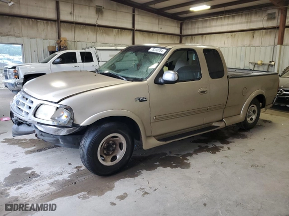1999 Ford F-150 Work Series with VIN 1FTZX1720XNA76671, listed as a Copart auction lot 73330264 with 0 mi miles and Salvage Title. Bid and sale history available at carsss.com. Image 1.