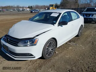 2016 Volkswagen Jetta Sedan 1.8T Sport with VIN 3VWD17AJ3GM392555, listed as a IAAI auction lot 41586893 with 56,859 mi miles. Bid and sale history available at carsss.com. Image 17.