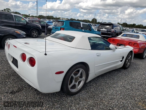 2000 Chevrolet Corvette with VIN 1G1YY32G3Y5104593, listed as a Copart auction lot 74254424 with 54,522 mi miles and Salvage Title. Bid and sale history available at carsss.com. Image 3.
