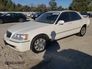 2000 Acura RL with VIN JH4KA9657YC004956, listed as a Copart auction lot 77944634 with 0 mi miles and Salvage Title. Bid and sale history available at carsss.com. Image 1.