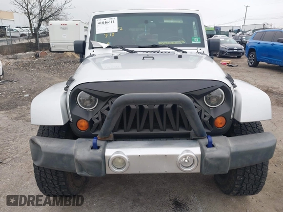 2008 Jeep Wrangler Unlimited Sahara с VIN 1J4GA59138L505460, выставлен на аукционе IAAI как лот 41846611 с пробегом 116 658 миль миль и . История ставок и продаж доступна на DreamBid. Изображение 12.