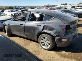 2024 Tesla Model Y Long Range с VIN 7SAYGDEEXRF032028, выставлен на аукционе Copart как лот 47128085 с пробегом 8 607 миль миль и Списание • Salvage title. История ставок и продаж доступна на DreamBid. Изображение 2.