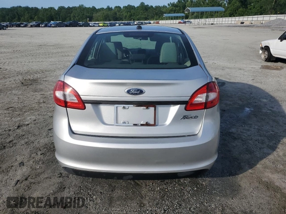 2013 Ford Fiesta S z VIN 3FADP4AJ9DM140665, wystawiony jako Copart lot #61634485 z przebiegiem 165 124 mil mil oraz Szkoda całkowita • Salvage title. Historia ofert i sprzedaży dostępna na DreamBid. Obrazek 6.