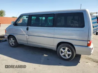 2002 Volkswagen EuroVan с VIN WV2KB47012H065431, выставлен на аукционе Copart как лот 49010445 с пробегом 78 985 миль миль и Чистый • Clean title. История ставок и продаж доступна на DreamBid. Изображение 2.