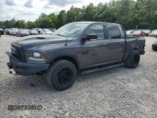 2017 Ram 1500 Rebel z VIN 1C6RR7YT2HS612311, wystawiony jako Copart lot #55109725 z przebiegiem 142 796 mil mil oraz Szkoda całkowita • Salvage title. Historia ofert i sprzedaży dostępna na DreamBid. Obrazek 1.