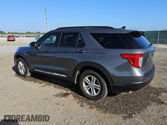 2022 Ford Explorer XLT with VIN 1FMSK8DH7NGA82496, listed as a Copart auction lot 51866865 with 77,014 mi miles and Clean Title. Bid and sale history available at carsss.com. Image 2.
