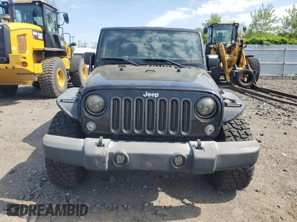 2015 Jeep Wrangler Unlimited Freedom с VIN 1C4BJWDG1FL609850, выставлен на аукционе Copart как лот 55169065 с пробегом 97 415 миль миль и Чистый • Clean title. История ставок и продаж доступна на DreamBid. Изображение 5.