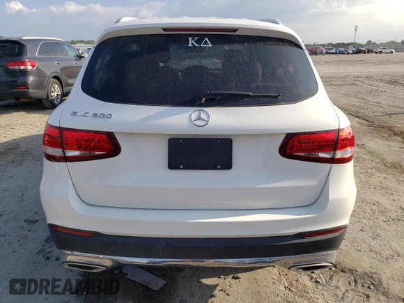 2019 Mercedes-Benz GLC 300 with VIN WDC0G4JB9KV159358, listed as a Copart auction lot 56053465 with 89,497 mi miles and Salvage title. Bid and sale history available at DreamBid. Image 6.