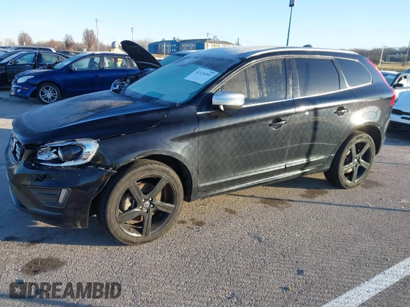 2014 Volvo XC60 R-Design Premier Plus z VIN YV4902DZ4E2537605, wystawiony jako IAAI lot #41126501 z przebiegiem 119 644 mil mil oraz . Historia ofert i sprzedaży dostępna na DreamBid. Obrazek 14.