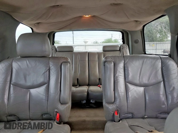 2004 Chevrolet Tahoe LT z VIN 1GNEC13Z84J171857, wystawiony jako Copart lot #57993315 z przebiegiem 239 893 mil mil oraz Szkoda całkowita • Salvage title. Historia ofert i sprzedaży dostępna na DreamBid. Obrazek 10.