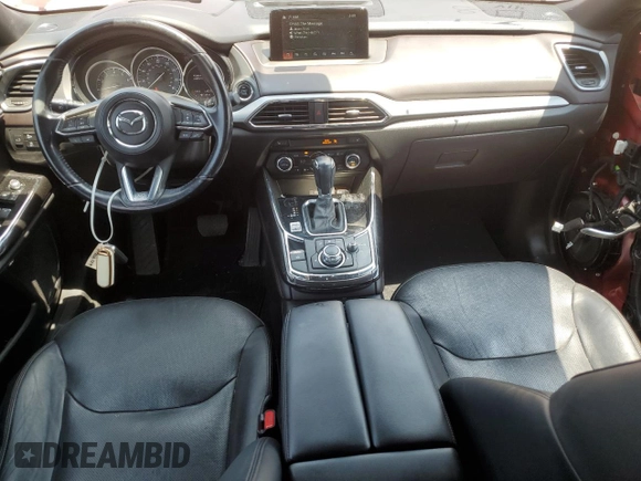 2016 Mazda CX-9 Grand Touring with VIN JM3TCADY6G0105783, listed as a Copart auction lot 63975195 with 135,972 mi miles and Salvage title. Bid and sale history available at DreamBid. Image 8.