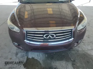 2013 Infiniti JX35 with VIN 5N1AL0MM9DC337002, listed as a Copart auction lot 51002775 with 128,836 mi miles and Salvage Title. Bid and sale history available at carsss.com. Image 14.