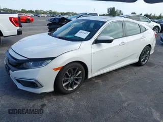 2021 Honda Civic Sedan EX with VIN 2HGFC1F37MH700657, listed as a IAAI auction lot 41633417 with 87,379 mi miles. Bid and sale history available at carsss.com. Image 17.
