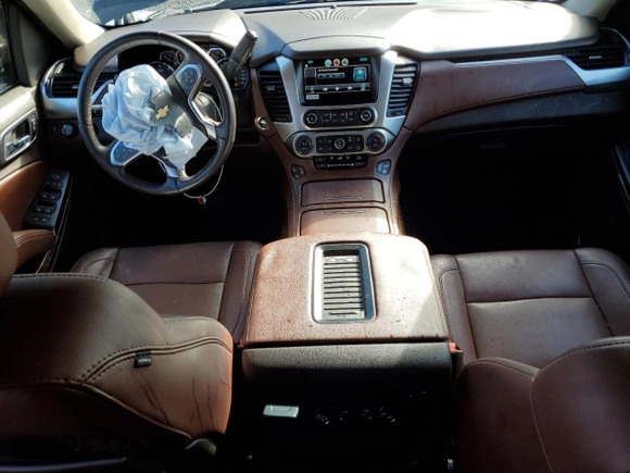 2015 Chevrolet Tahoe LTZ z VIN 1GNSKCKC5FR638011, wystawiony jako Copart lot #49269395 z przebiegiem 127 427 mil mil oraz Szkoda całkowita • Salvage title. Historia ofert i sprzedaży dostępna na DreamBid. Obrazek 8.