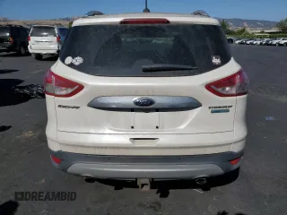 2014 Ford Escape Titanium z VIN 1FMCU0J9XEUD01904, wystawiony jako Copart lot #61819555 z przebiegiem 217 794 mil mil oraz Czysty tytuł • Clean title. Historia ofert i sprzedaży dostępna na DreamBid. Obrazek 6.