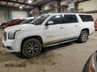 2015 GMC Yukon XL SLT with VIN 1GKS2HKC1FR541866, listed as a Copart auction lot 42756225 with 166,915 mi miles and Salvage Title. Bid and sale history available at carsss.com. Image 1.