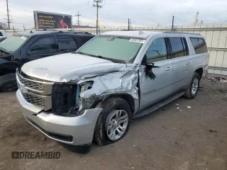 2018 Chevrolet Suburban LT with VIN 1GNSCHKCXJR332103, listed as a Copart auction lot 82861393 with 143,607 mi miles and . Bid and sale history available at DreamBid. Image 1.