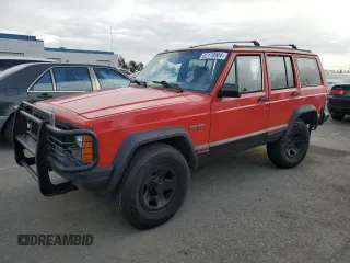 1996 Jeep Cherokee Sport with VIN 1J4FT68S8TL232241, listed as a Copart auction lot 82170904 with 287,125 mi miles and Salvage Title. Bid and sale history available at carsss.com. Image 1.