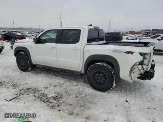 2023 Nissan Frontier PRO-4X with VIN 1N6ED1EK0PN660799, listed as a Copart auction lot 89086105 with 34,178 mi miles and Salvage Title. Bid and sale history available at carsss.com. Image 2.