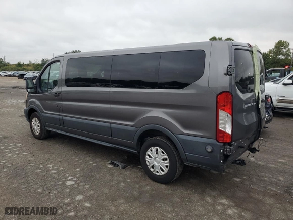 2015 Ford Transit Wagon XL with VIN 1FBZX2YM9FKA53447, listed as a Copart auction lot 71352834 with 179,071 mi miles and Salvage Title. Bid and sale history available at carsss.com. Image 2.