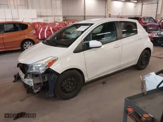 2012 Toyota Yaris L with VIN JTDKTUD38CD507480, listed as a IAAI auction lot 41299057 with 170,675 mi miles. Bid and sale history available at carsss.com. Image 2.