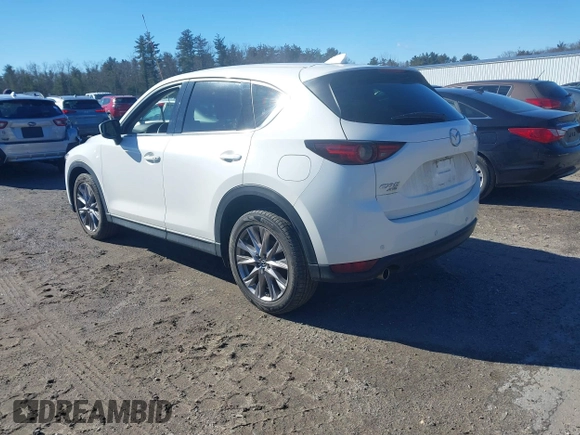 2019 Mazda CX-5 Grand Touring with VIN JM3KFBDM2K0672720, listed as a IAAI auction lot 41751196 with 51,632 mi miles and . Bid and sale history available at carsss.com. Image 3.
