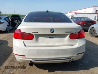 2013 BMW 3 Series 335i xDrive with VIN WBA3B9C54DF587421, listed as a IAAI auction lot 42165857 with 142,331 mi miles. Bid and sale history available at carsss.com. Image 16.