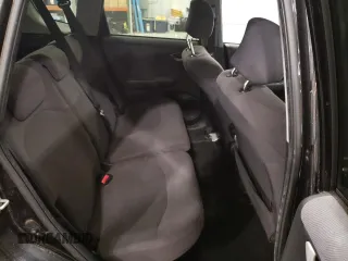 2009 Honda Fit with VIN JHMGE88259S053426, listed as a Copart auction lot 87894815 with 143,665 mi miles and Salvage Title. Bid and sale history available at carsss.com. Image 10.