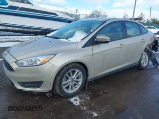 2018 Ford Focus SE with VIN 1FADP3F29JL268543, listed as a IAAI auction lot 41578293 with 73,344 mi miles. Bid and sale history available at carsss.com. Image 2.