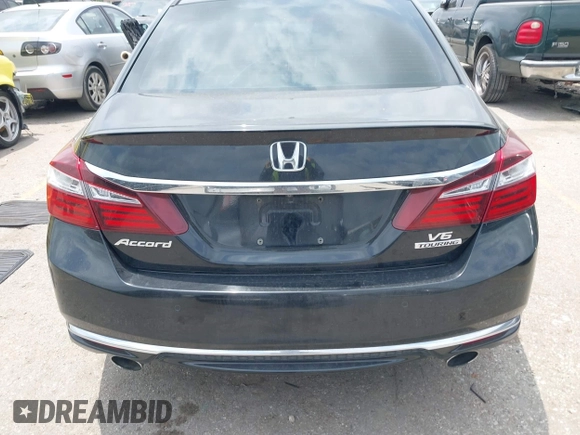 2016 Honda Accord Touring with VIN 1HGCR3F94GA004410, listed as a IAAI auction lot 42288402 with 139,068 mi miles and . Bid and sale history available at DreamBid. Image 16.
