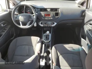 2014 Kia Rio LX with VIN KNADM4A38E6415462, listed as a Copart auction lot 52143555 with 60,079 mi miles and Salvage Title. Bid and sale history available at DreamBid. Image 8.