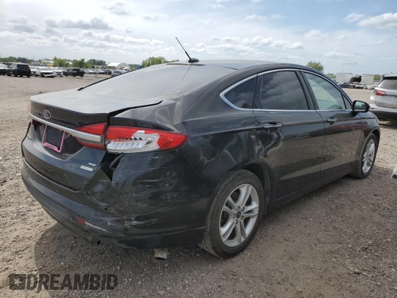 2018 Ford Fusion SE z VIN 3FA6P0HD8JR217719, wystawiony jako Copart lot #53429555 z przebiegiem 108 953 mil mil oraz Szkoda całkowita • Salvage title. Historia ofert i sprzedaży dostępna na DreamBid. Obrazek 3.