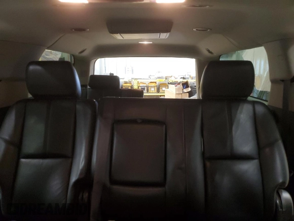 2013 Chevrolet Suburban LT with VIN 1GNSKJE72DR236026, listed as a Copart auction lot 86153104 with 222,417 mi miles and Salvage title. Bid and sale history available at DreamBid. Image 10.