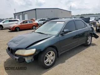 1999 Honda Accord LX with VIN 1HGCG6650XA028790, listed as a Copart auction lot 61014405 with 362,319 mi miles and Salvage title. Bid and sale history available at DreamBid. Image 1.
