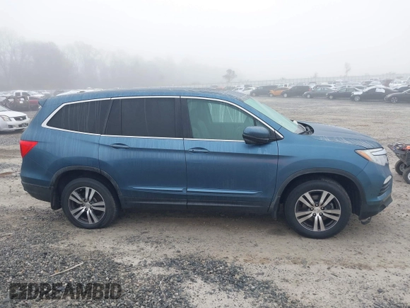 2016 Honda Pilot EX-L z VIN 5FNYF5H63GB007303, wystawiony jako IAAI lot #41487240 z przebiegiem 195 013 mil mil oraz . Historia ofert i sprzedaży dostępna na DreamBid. Obrazek 13.