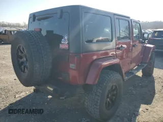 2012 Jeep Wrangler Unlimited Rubicon with VIN 1C4HJWFG4CL114089, listed as a Copart auction lot 49436495 with 189,079 mi miles and Salvage title. Bid and sale history available at DreamBid. Image 3.