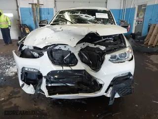 2019 BMW X4 xDrive30i with VIN 5UXUJ3C56KLG56553, listed as a IAAI auction lot 41365333 with 77,727 mi miles. Bid and sale history available at carsss.com. Image 18.
