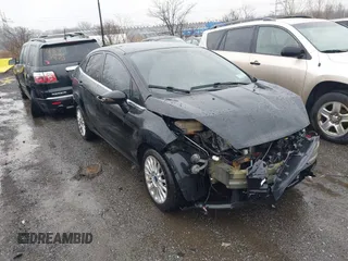 2016 Ford Fiesta Titanium z VIN 3FADP4CJ4GM135231, wystawiony jako IAAI lot #41839821 z przebiegiem 95 593 mil mil oraz . Historia ofert i sprzedaży dostępna na DreamBid. Obrazek 1.
